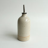 Large white stoneware oil pourer