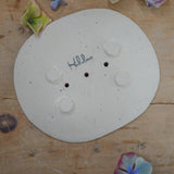 Underside of soap dish showing Habulous logo and feet