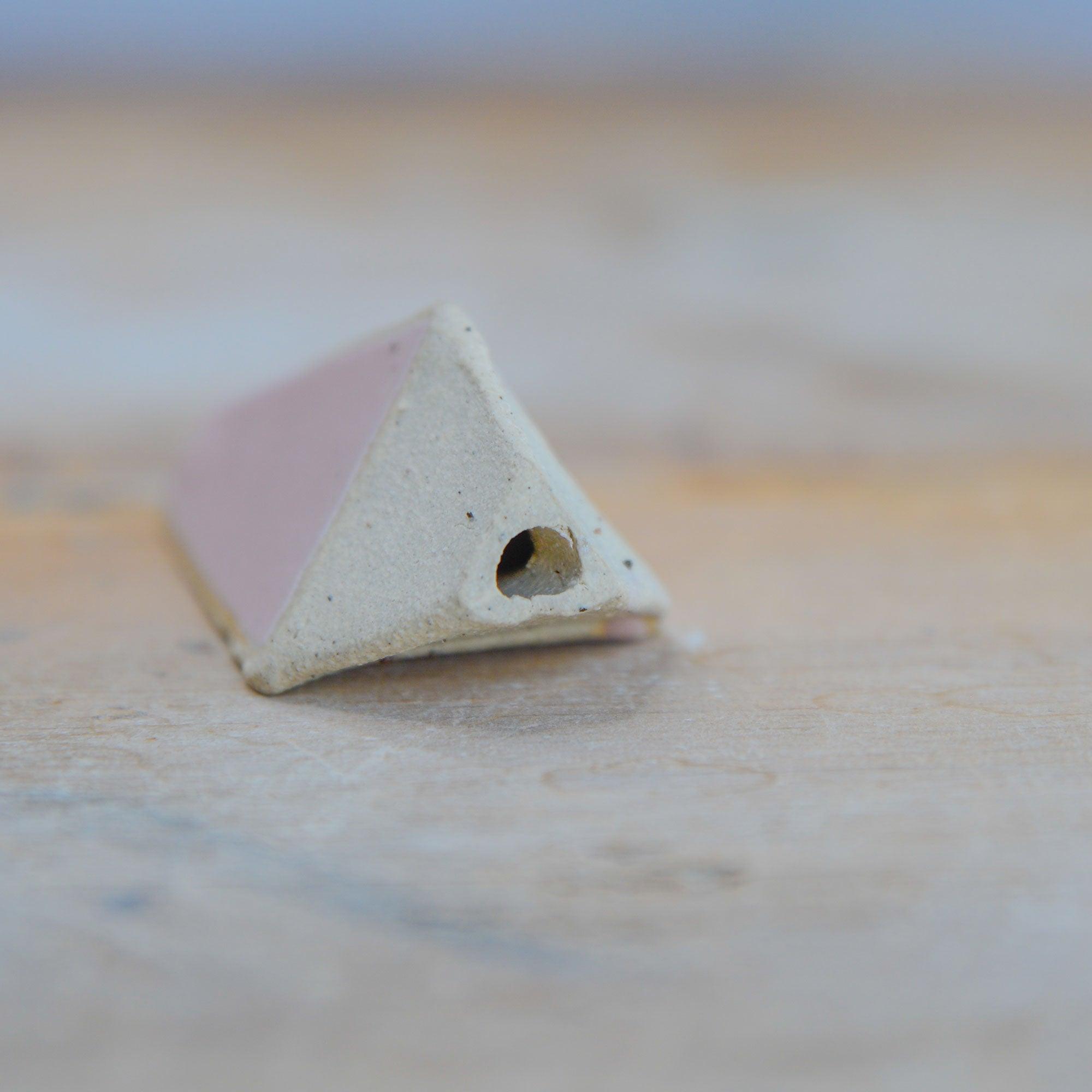 Close up of base opening on light pull handle