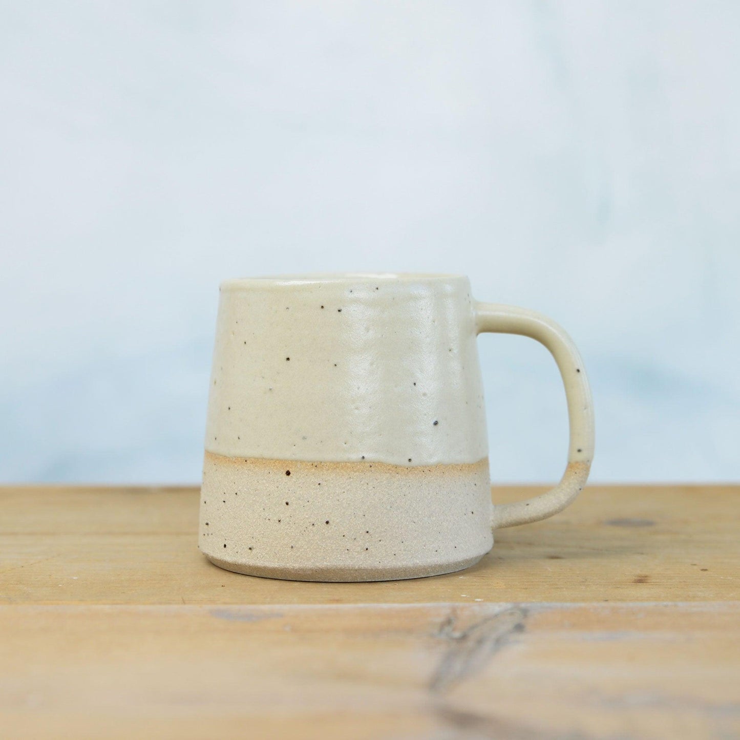 Light Yellow Mug Stone close up of stoneware texture