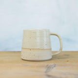 Light Yellow Mug Stone close up of stoneware texture