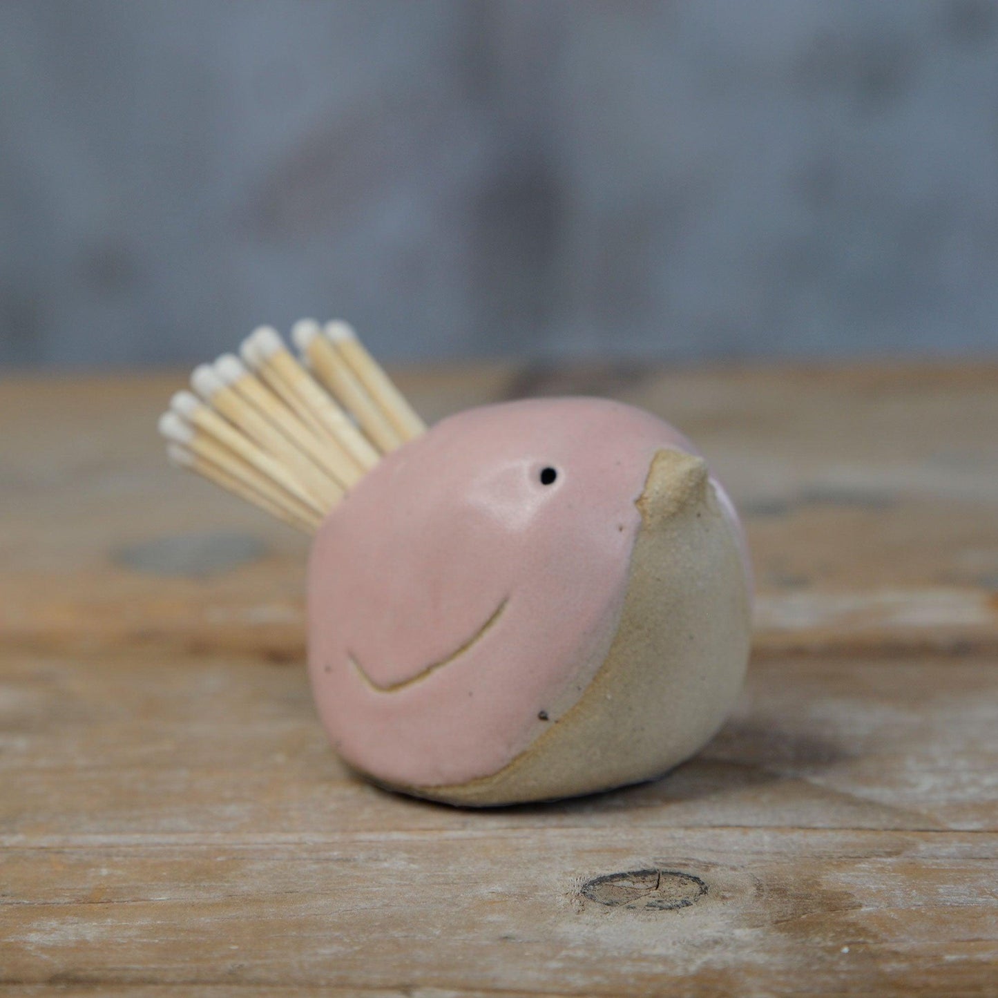 Close up of pink glaze on bird
