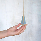 Blue light pull handle being held up close
