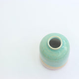 Above view showing the white tin glaze inside the mini vase
