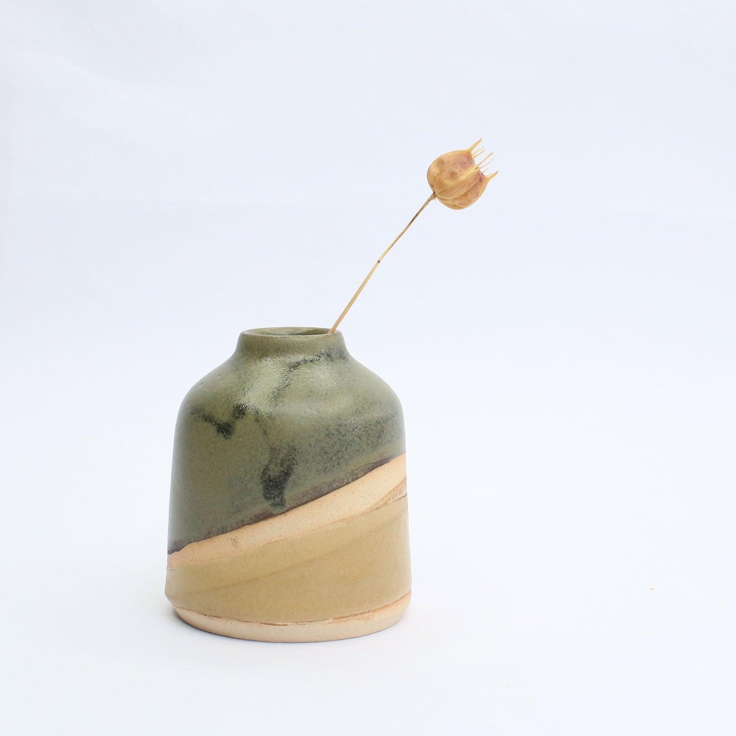 Another side view of Mini Vase with a dried seed head in