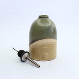 Nozzle next to oil pourer