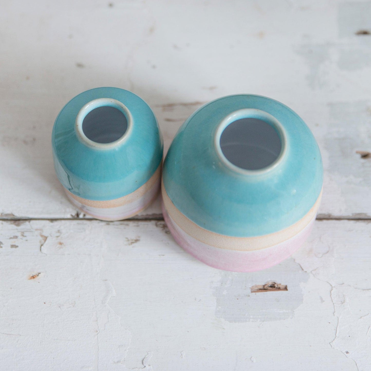 Above view showing the white tin inside of both the mini and the dome vase
