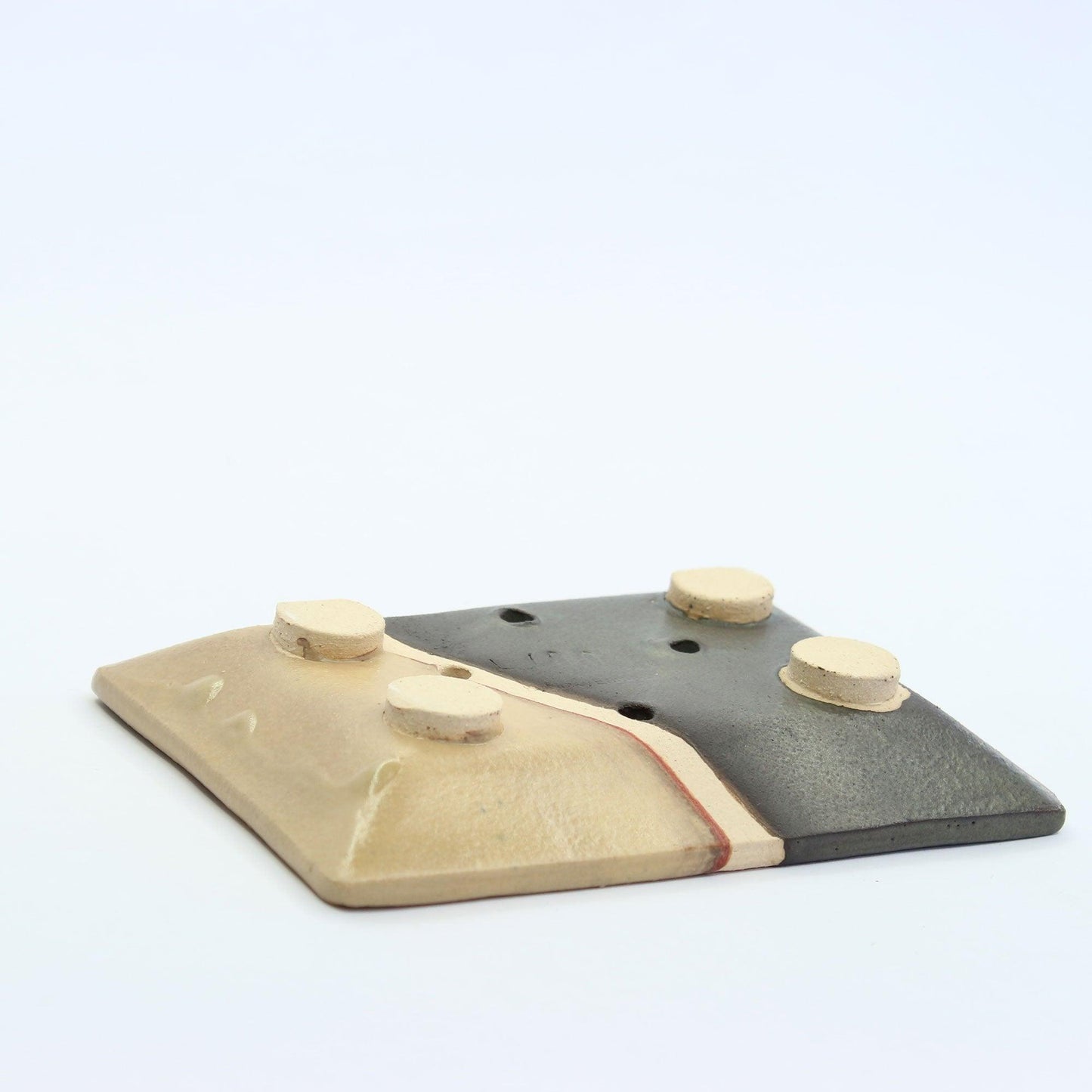 Underside of the moorland soap dish showing four clay feet