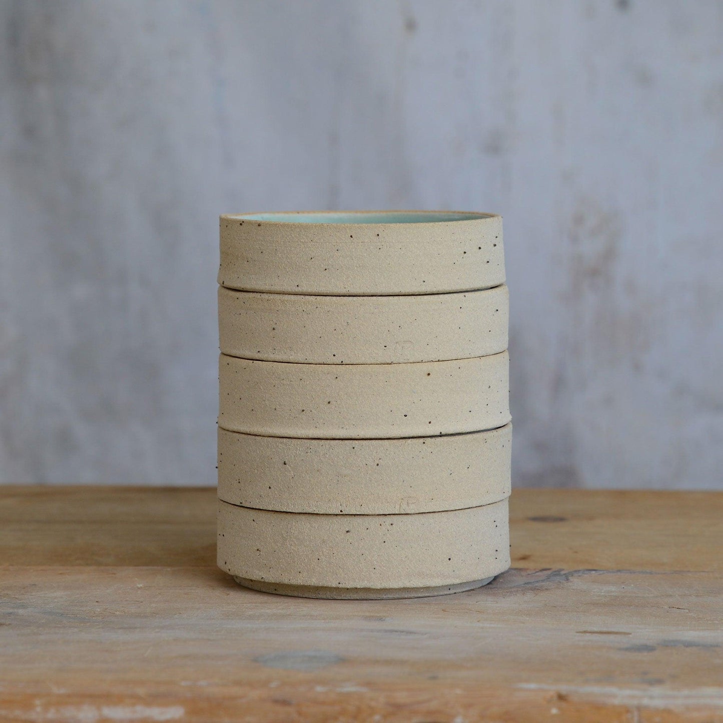 Stack of five stoneware nibbles bowls